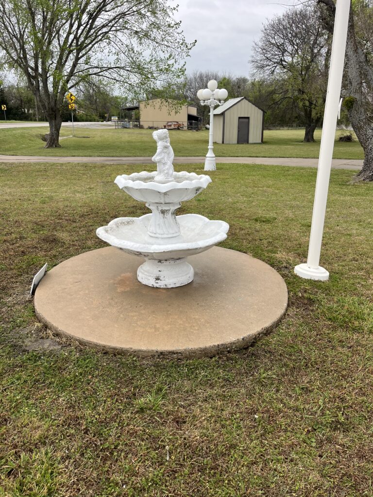 Pressure washing fountain landscape